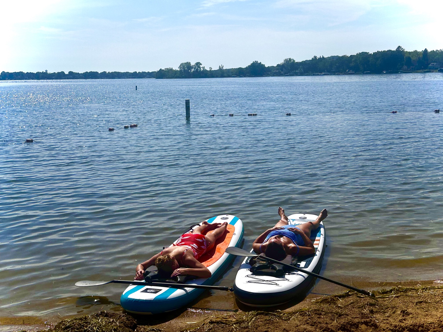 Mom and Willow after paddleboarding on the lake